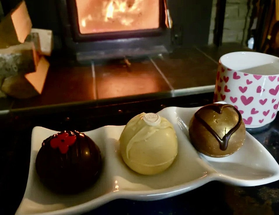 Hot chocolate bombs by a fireplace Vancouver Island