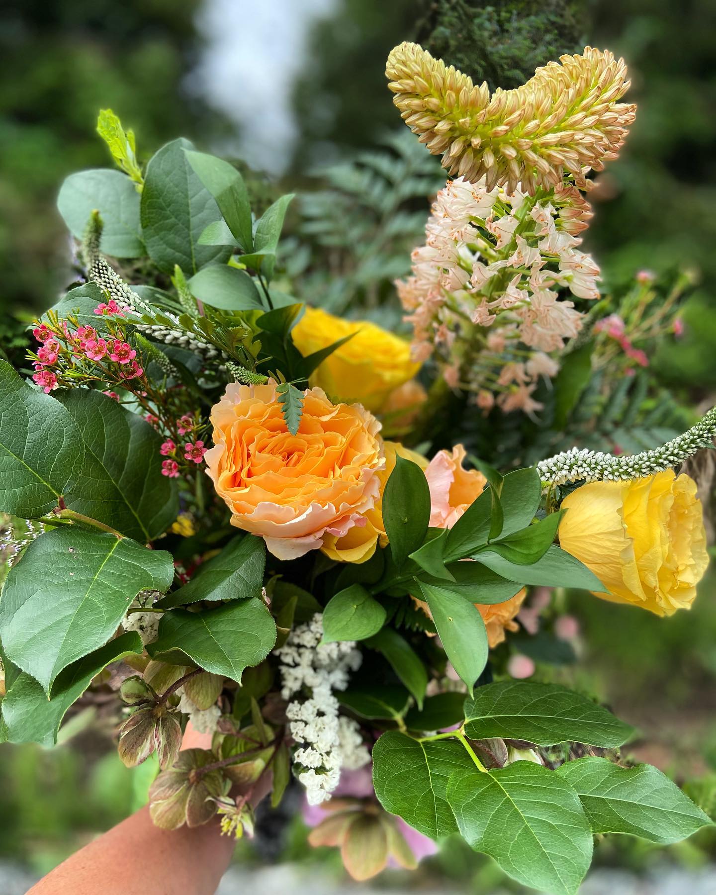 Yellow flower bouquet with a foxtail lily.