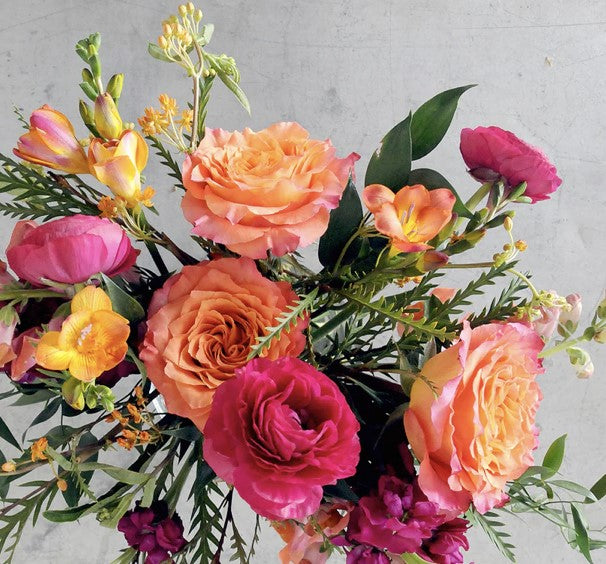 Orange, yellow and pink flowers.
