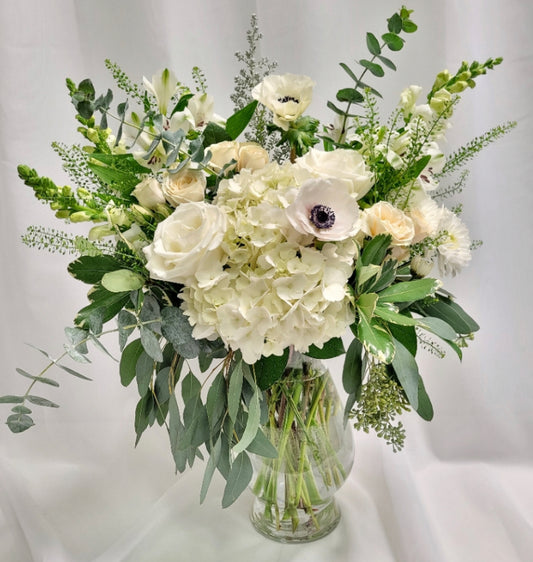 White and green floral arrangement.