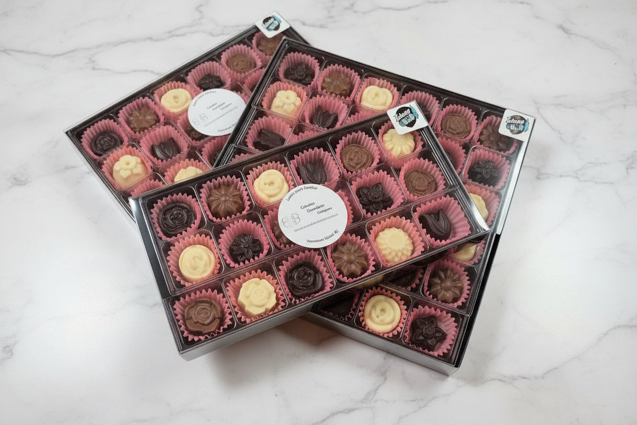 multiple boxes of chocolate flowers 