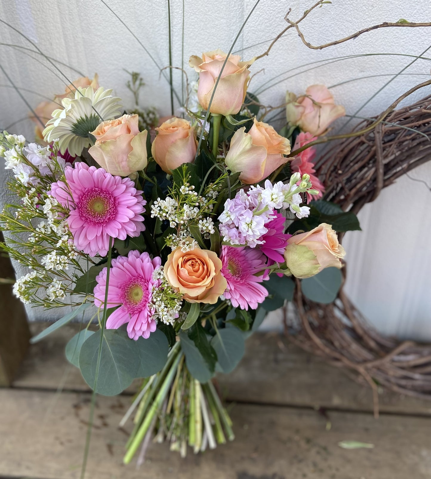 Flower bouquet with different shades of pink flowers. 
